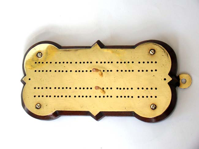 A fine Victorian brass cribbage board on a shaped oak base circa 1860 — image 2